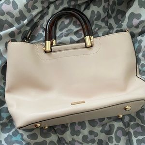 A creamy leather shoulder bag